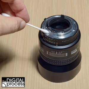 cleaning a camera lens